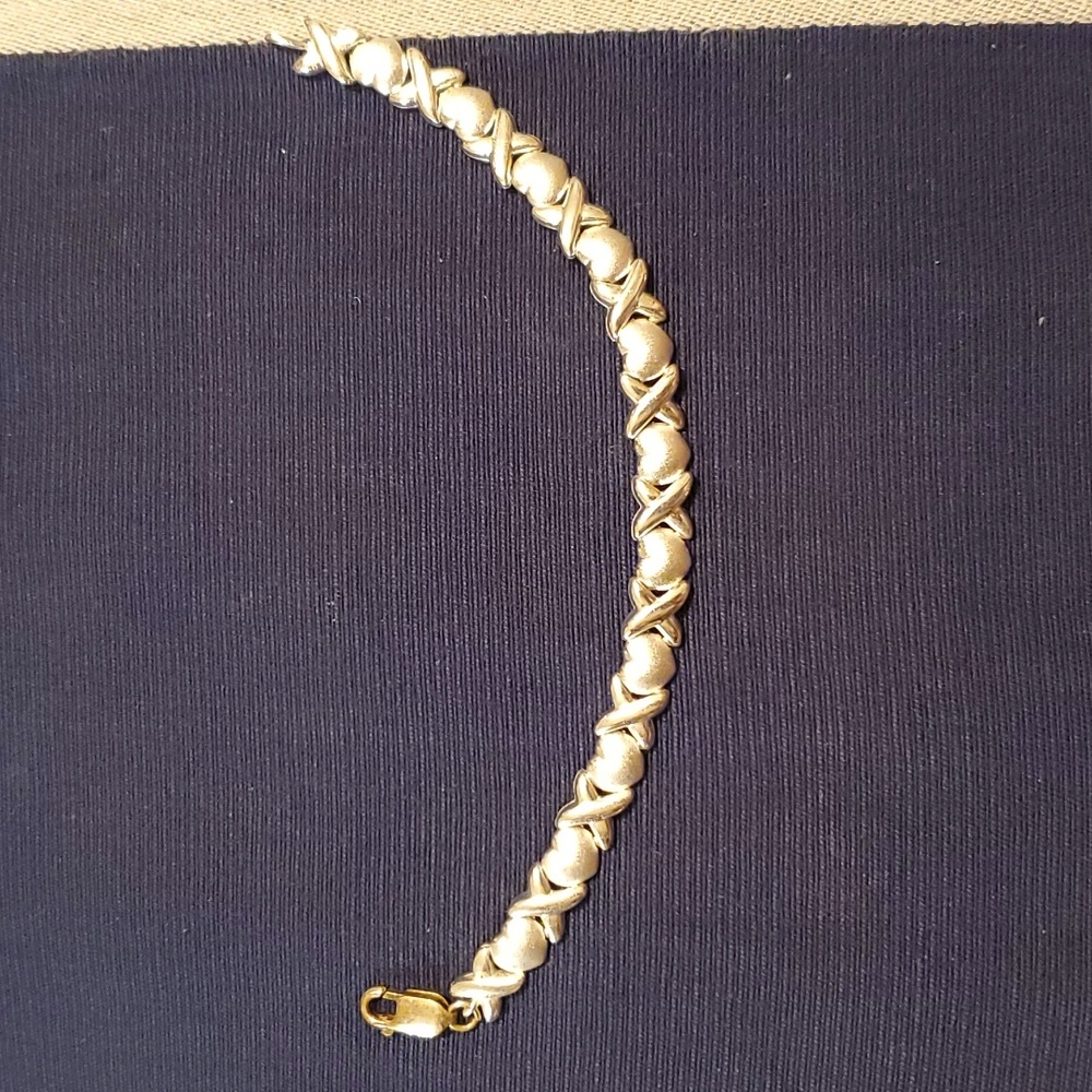 Silver Bracelet with X's and Hearts with matching earrings